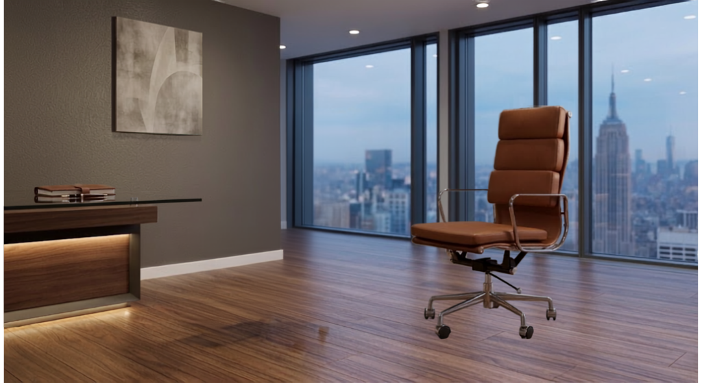 Eames style soft pad office chair in tan leather on a polished aluminium base, in a skyline office
