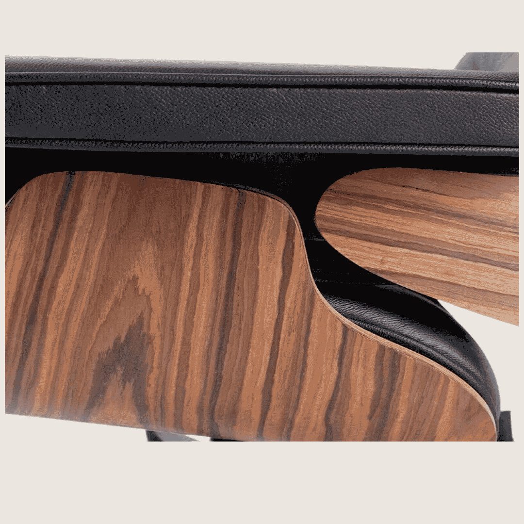 Tall (91cm) — Black leather, Light Rosewood shell, close-up of the armrest and veneer grain